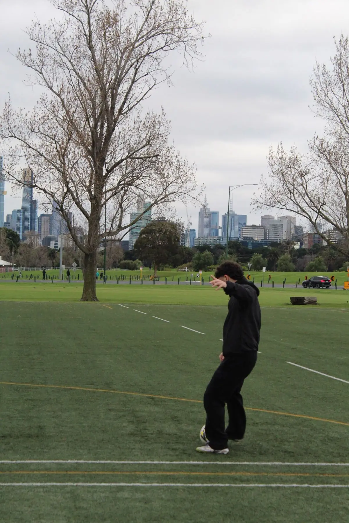 A player practising ball control on the park